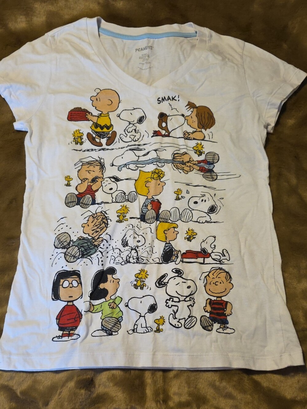 Peanuts White Graphic V‑Neck Tee with Multicolor Strip Art